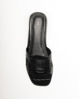 Rowan Slide — Side Profile, Embossed Leather