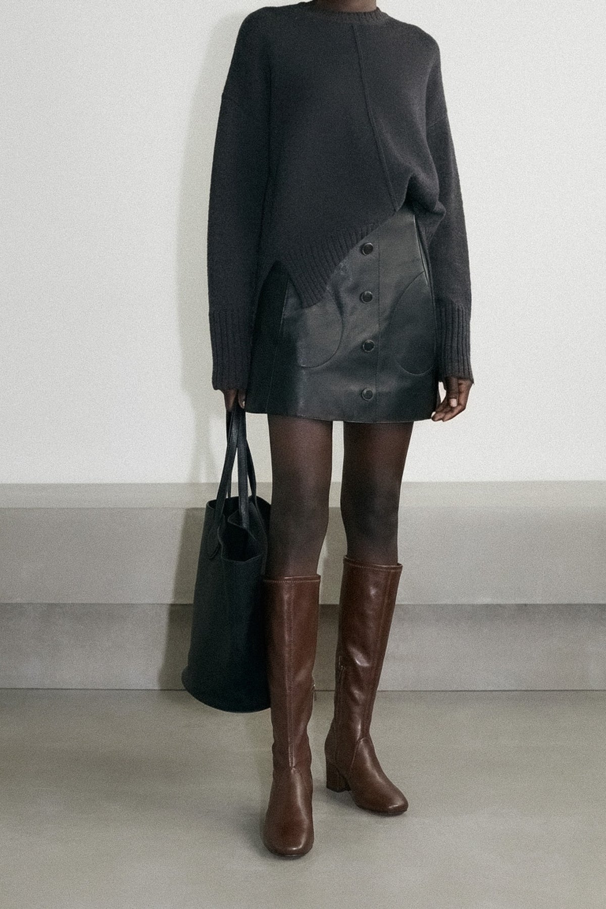 ros studio AW26, tall boot worn with tights